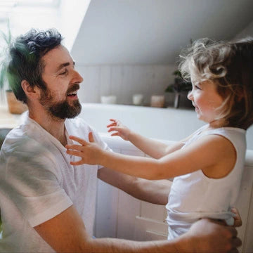 mature-father-with-small-daughter-indoors-at-home-2022-01-19-00-01-33-utc_1.webp